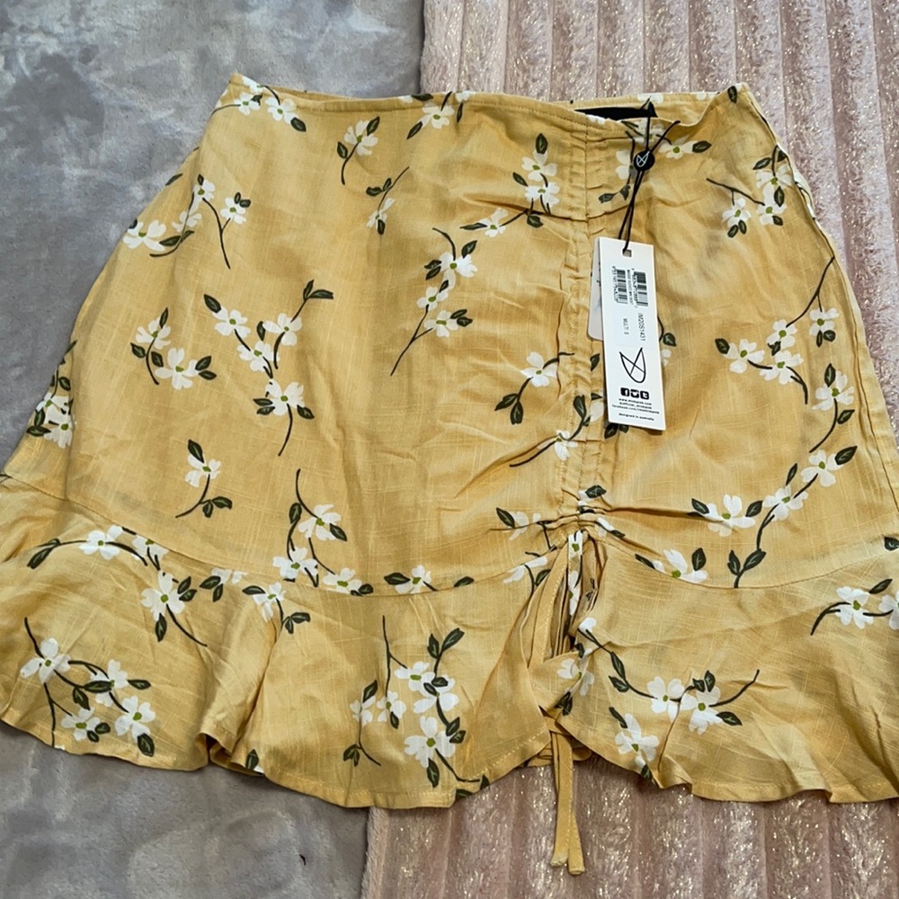 Mink pink mini skirt  , priced at Revolve for $64